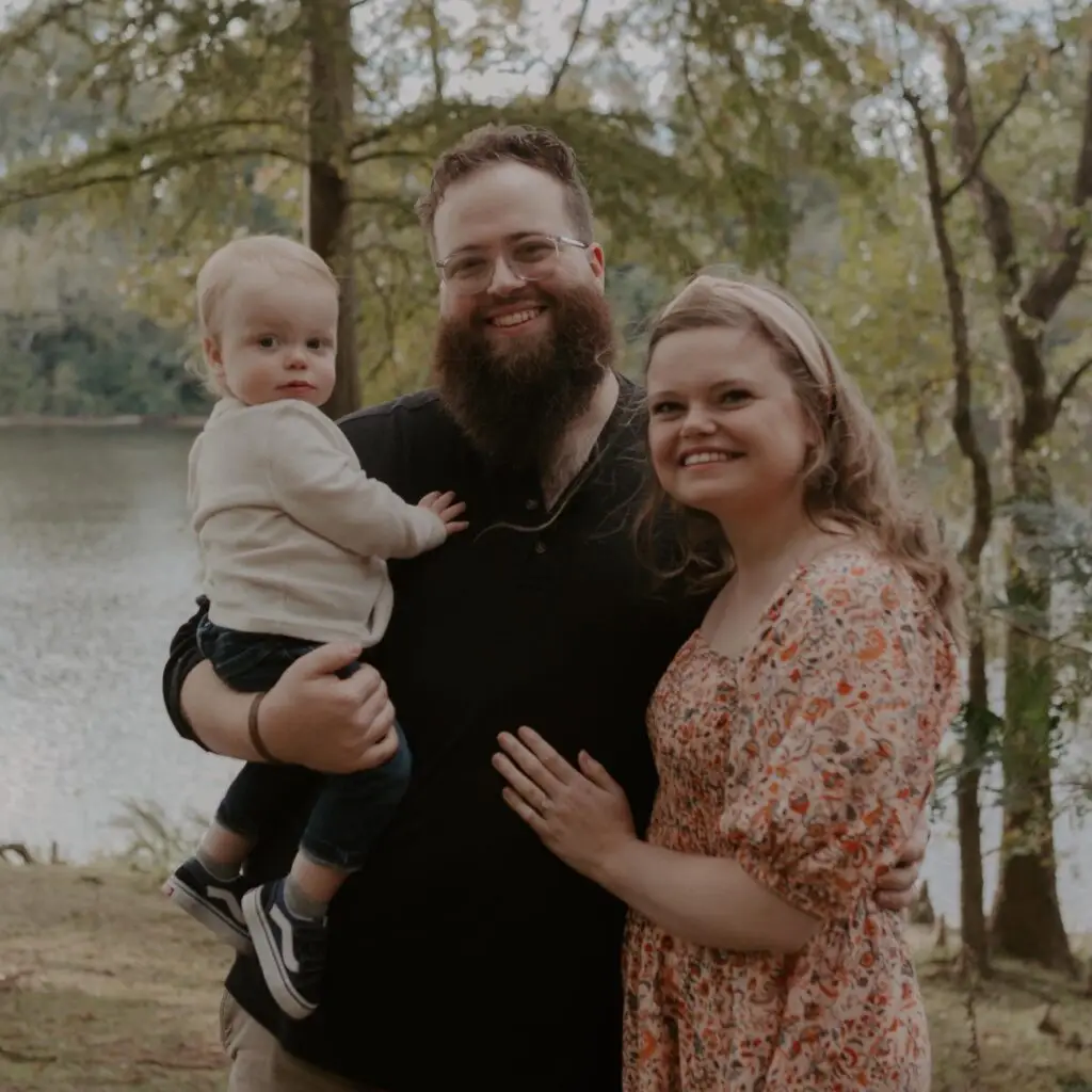 Zach Brown with his wife and son